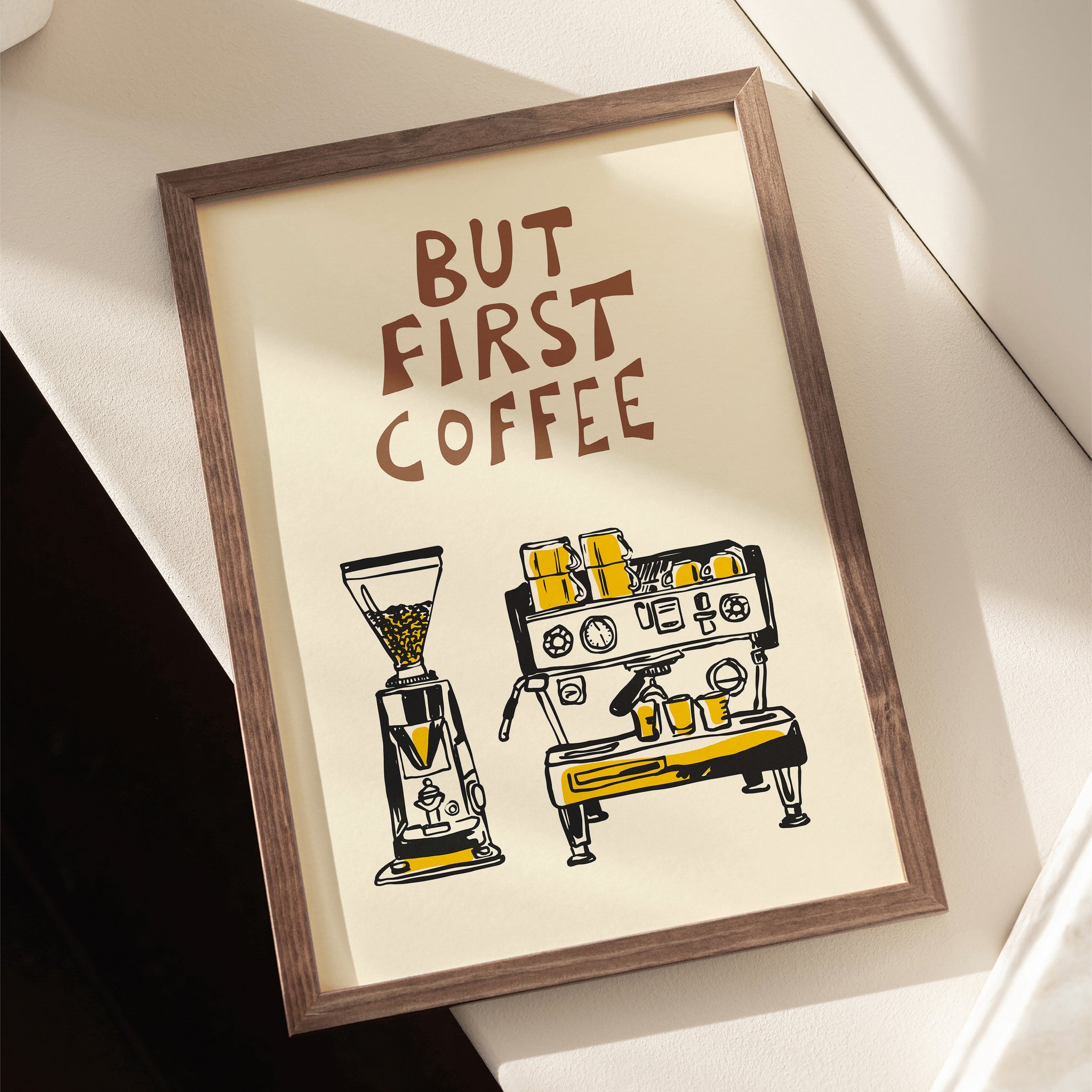 Coffee wall art with a retro espresso machine, grinder, and "But First Coffee" quote in bold typography