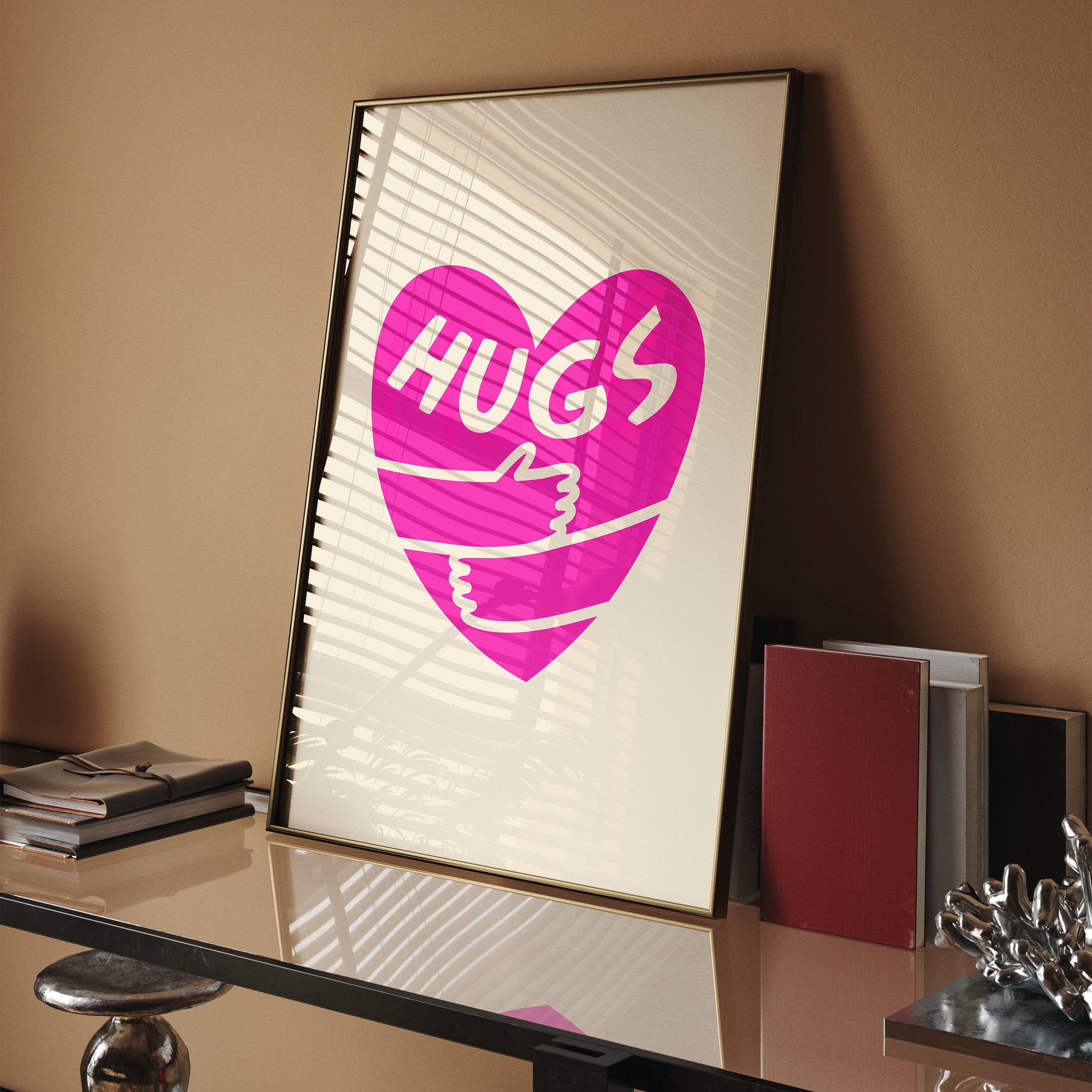 Playful pink heart with 'Hugs' text and wrap-around arms on beige backdrop