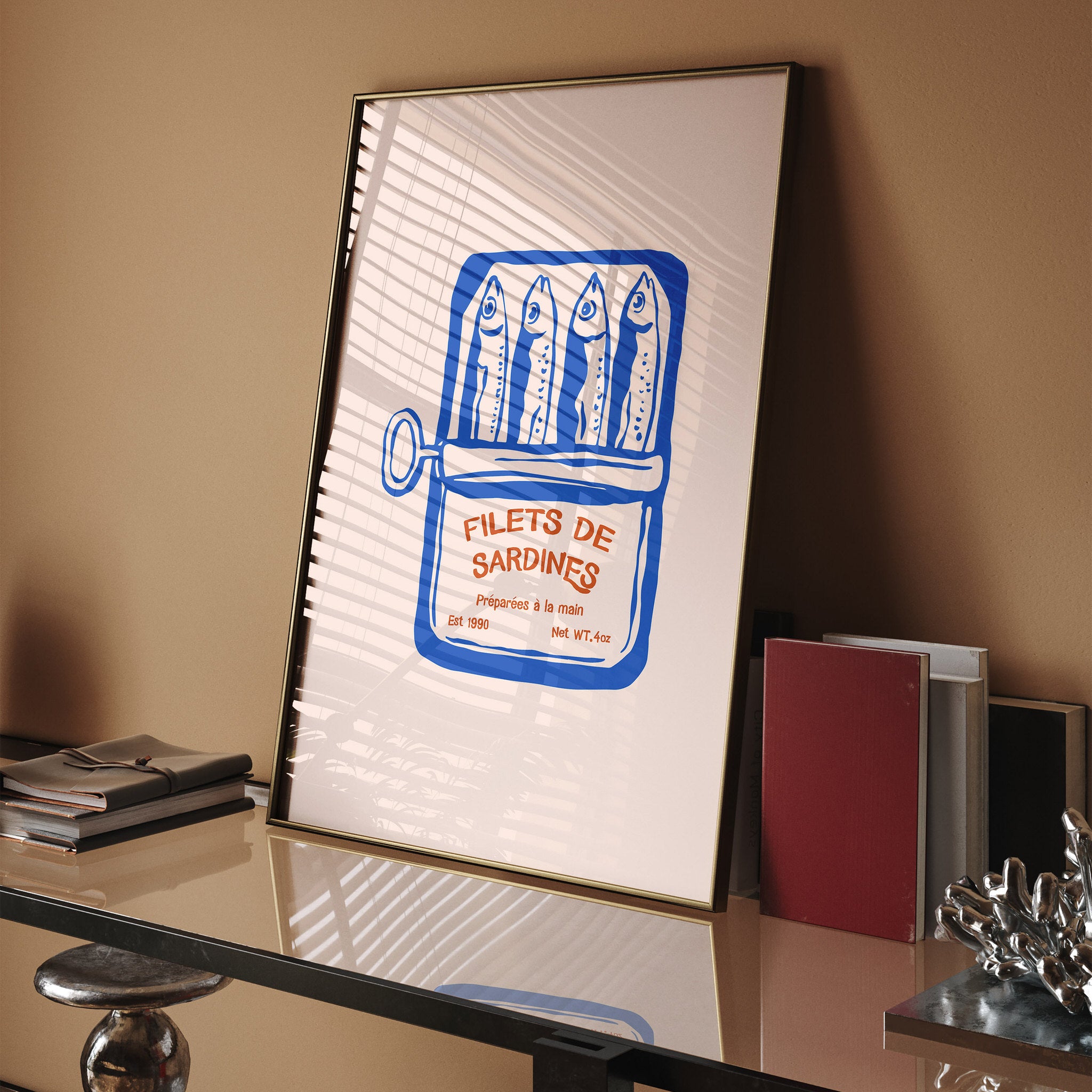 Sardine can art with French text in red and blue